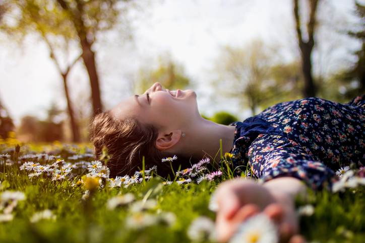 Pretty young teenage girl relaxing on a grass Pretty young teenage girl relaxing on a grass